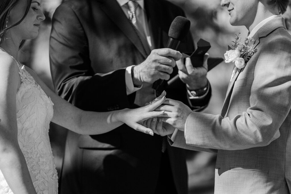 Exchanging of rings at the ceremony at Serendipity venue in Flagstaff